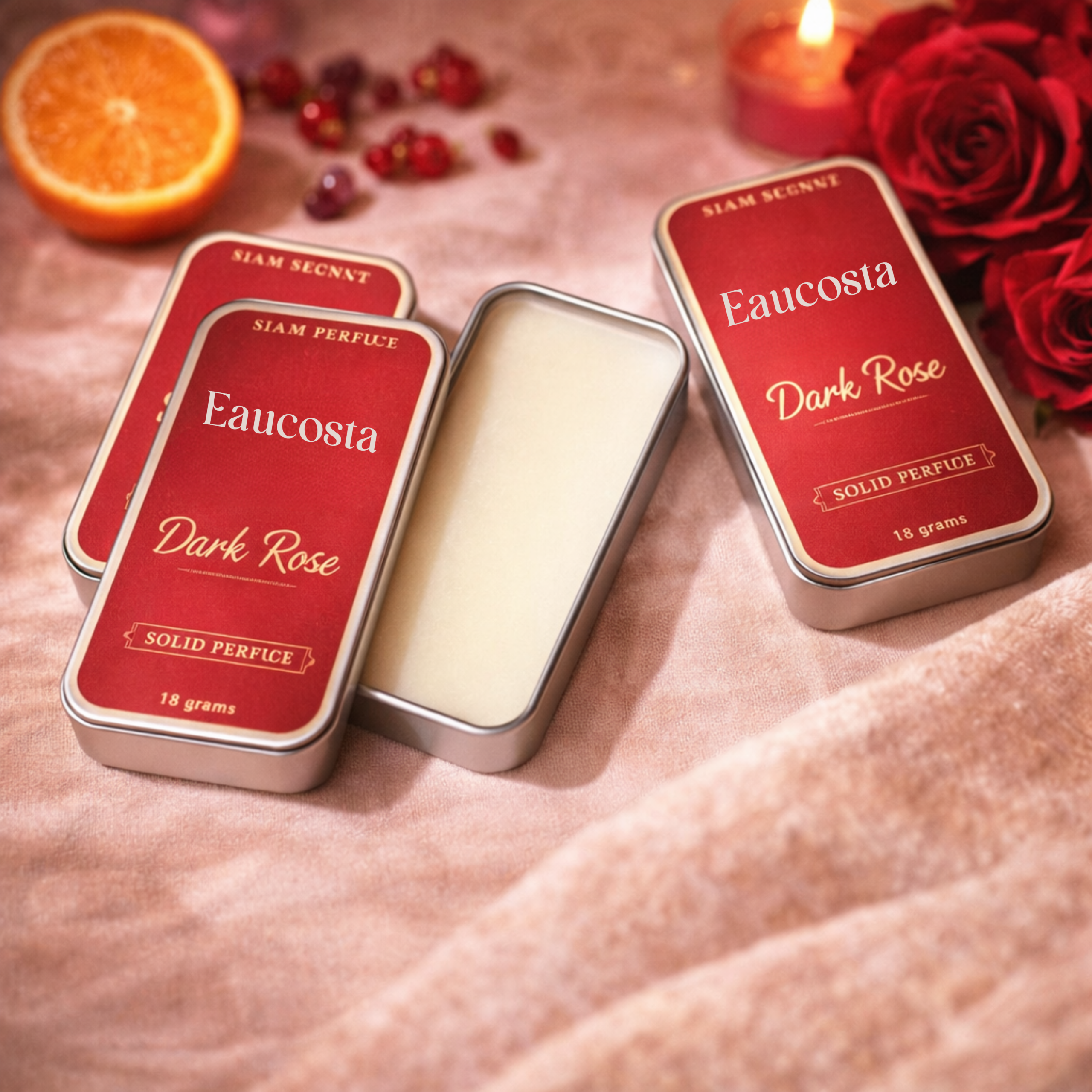 Dark Rose solid perfume by Eaucosta in red metal tin with open balm, fruity sweet rose and vanilla fragrance
